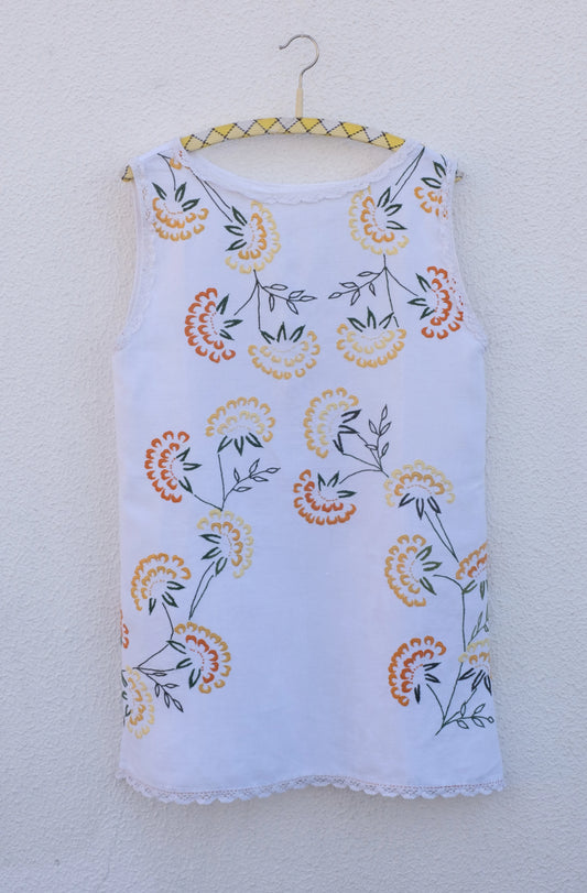 TOP SIN MANGAS CLAVEL FLORAL